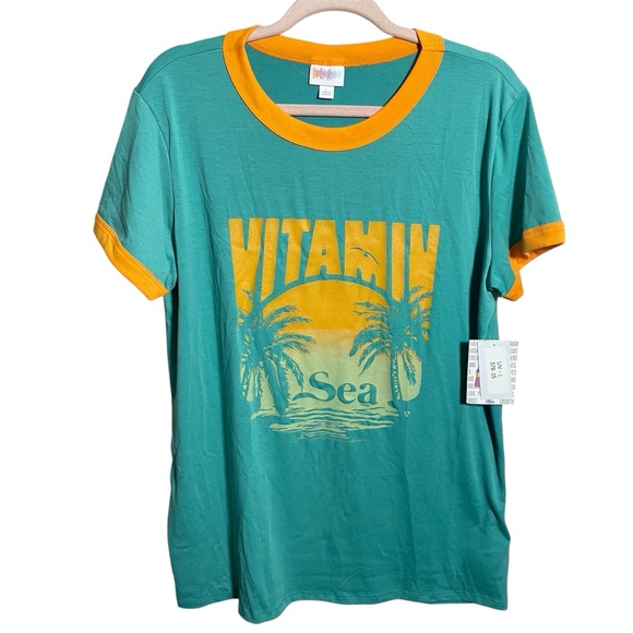 LuLaRoe Tops - Lularoe Liv Tee “Vitamin Sea” new with tags